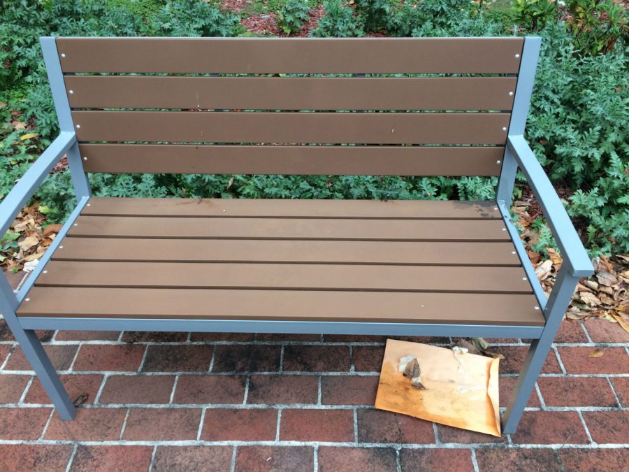 The next clue was located outside in the courtyard, under this bench. 
