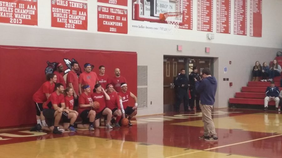Teachers take the win in Friday nights basketball game. Photo by: Ariel Barbera