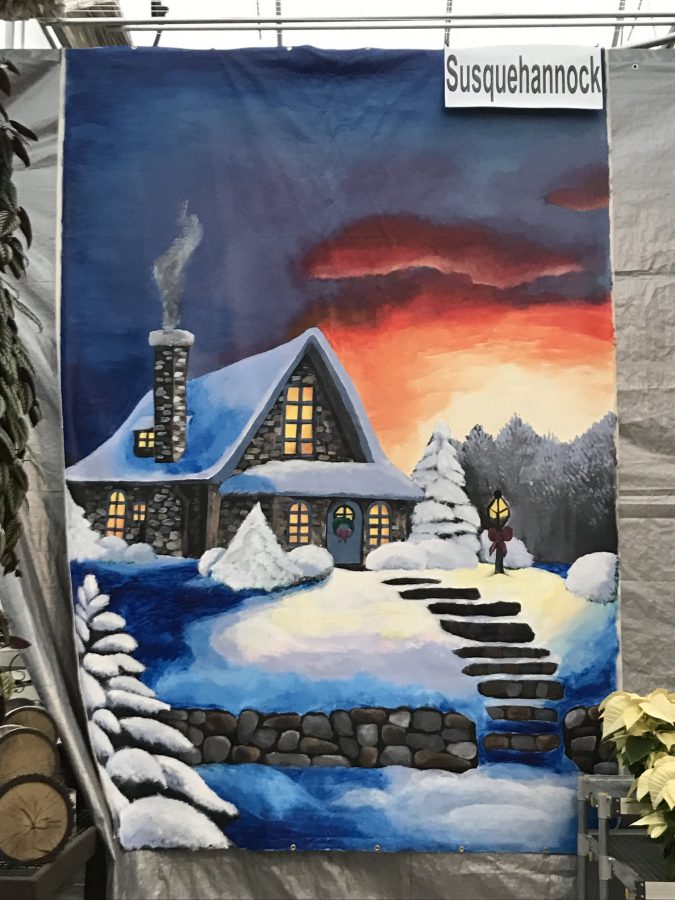 Juniors Stevie King and Sammi Patterson constructed a winter-themed mural to display in the art contest. Photo Courtesy: Stevie King