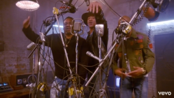 Q-Tip, Jarobi White and Ali Shaheed Muhammed jamming together in the "We The People" music video. 
