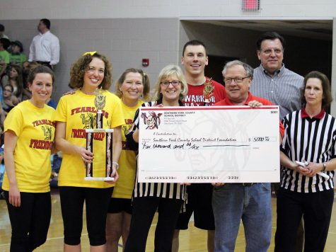 Schools Battle to Raise Money for Scholarship Program