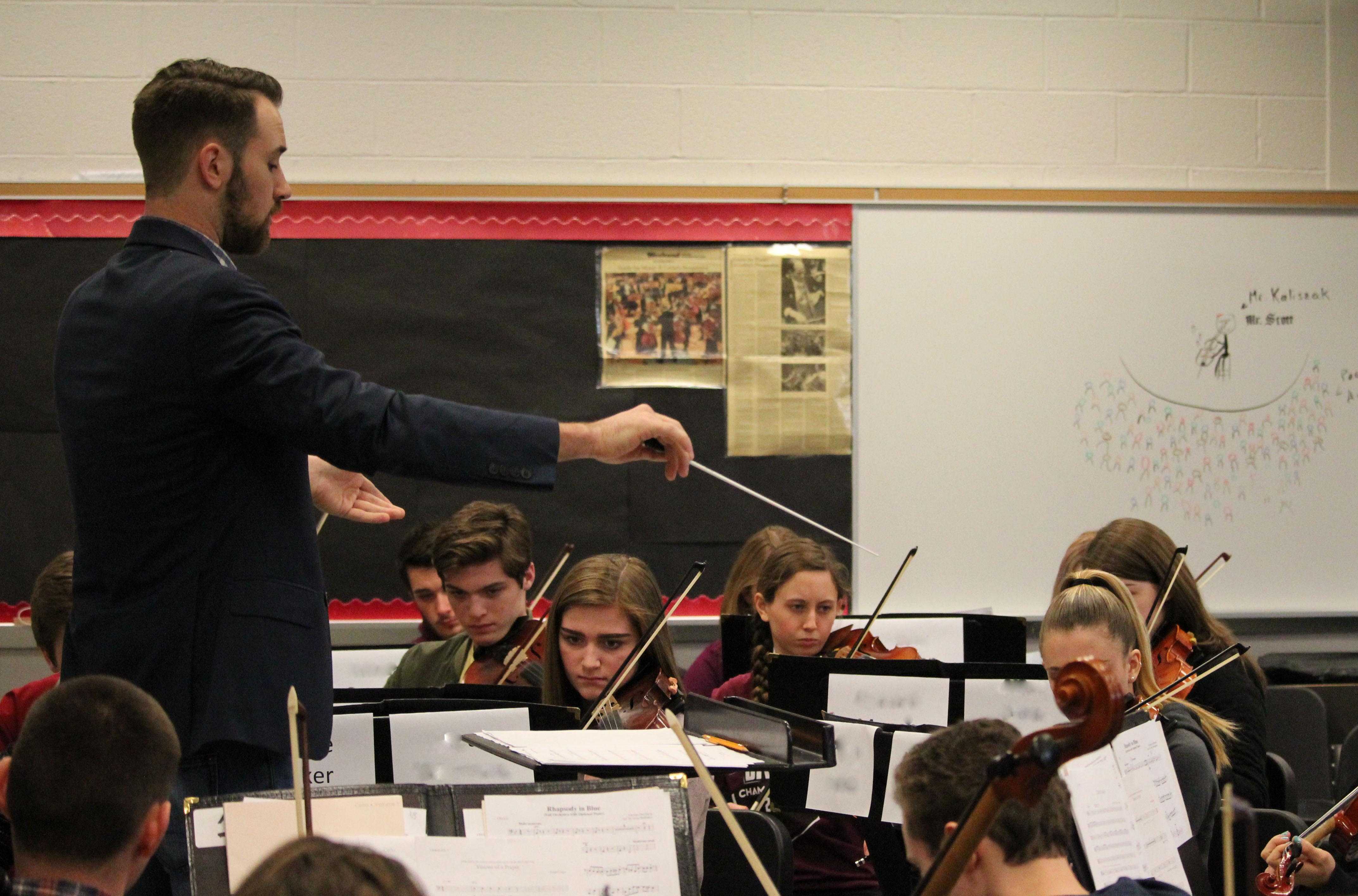 Susquehannock High School orchestra students rehearse for their chamber music concert under the direction of guest conductor Derek Cooper from the Manhattan School of Music.