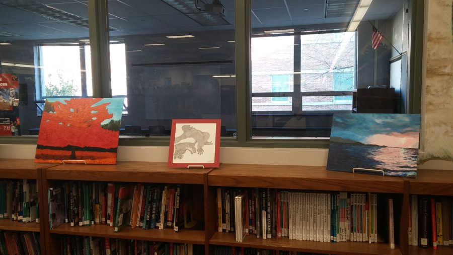 The library is currently displaying a variety of different pieces from the  art students. Photo by: Ariel Barbera