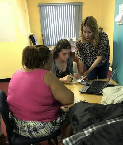 Spanish 4 and 5 Students Help at Hispanic Center
