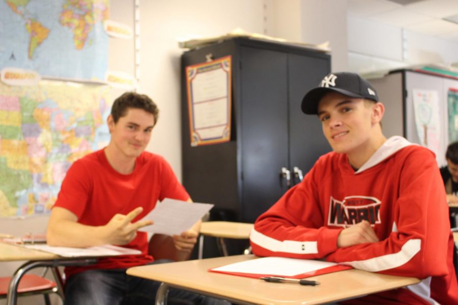 [From left to right] Seniors Tanner Bonitz and Reese Jackson work in government class. Photo by Christopher Norris