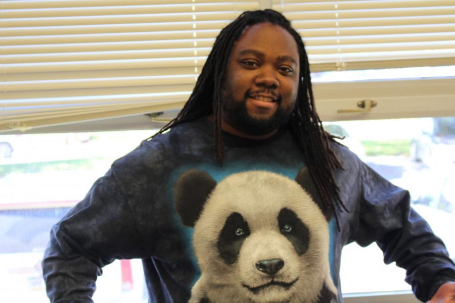 School Counselor Matthew Shervington shows off his panda bear shirt. Photo by Christopher Norris