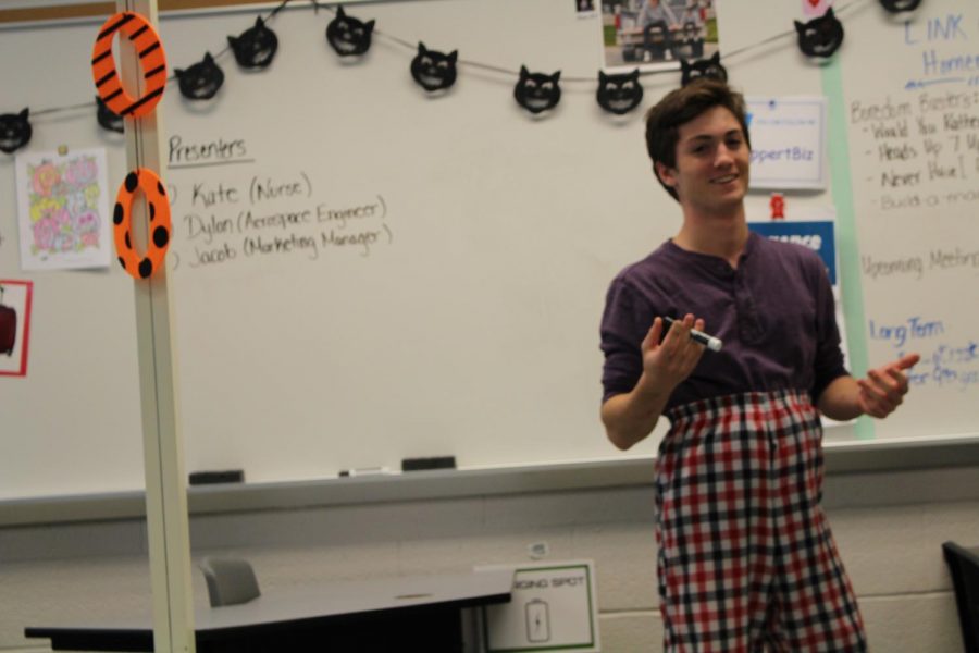 Junior Collin Addotta presents an argument during his business law class. Photo by Christopher Norris