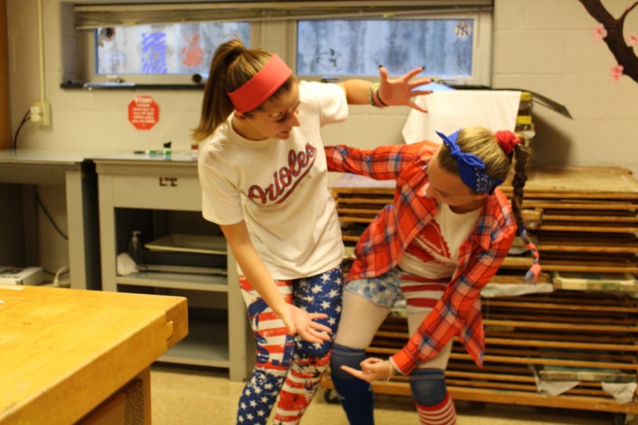 [From left to right] Freshman Stephanie Graffin and junior Julia Kelbaugh try to find the perfect pose. Photo by Christopher Norris
