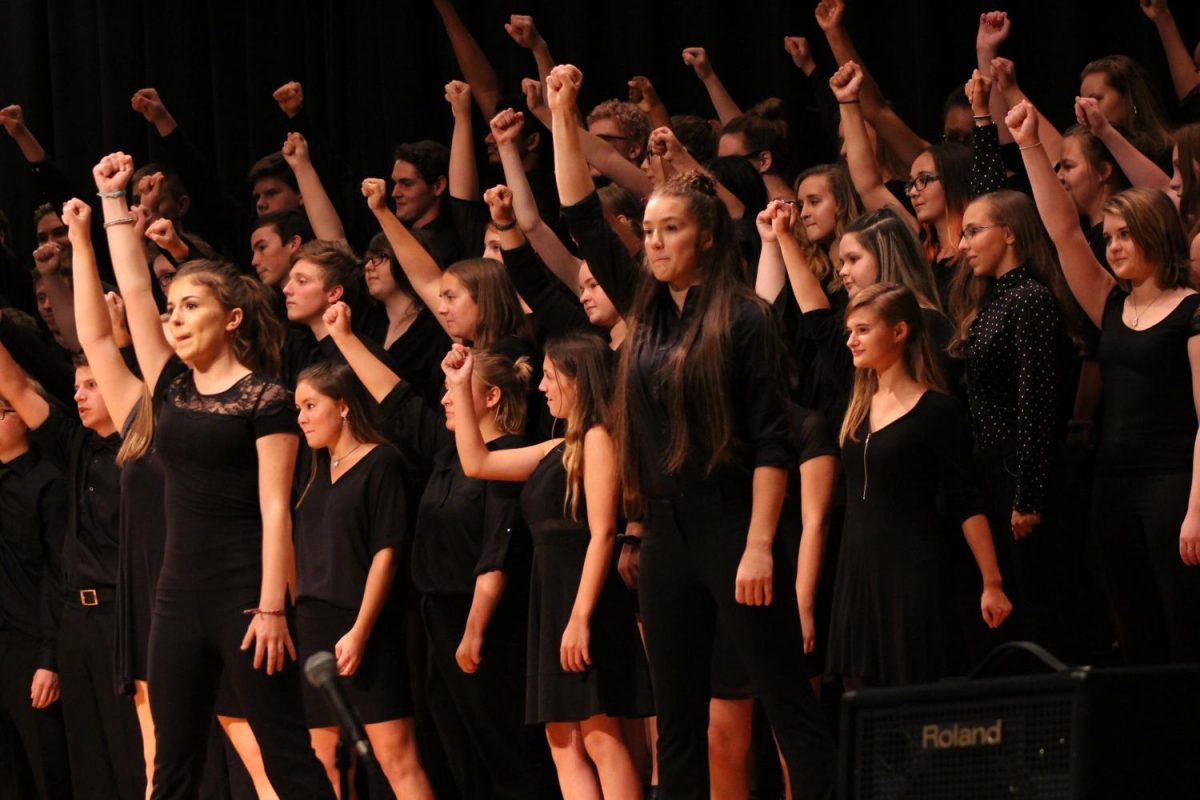 The choir closes strong in their encore of the finale of A Step in Time. Photo By: Lizzy Beall