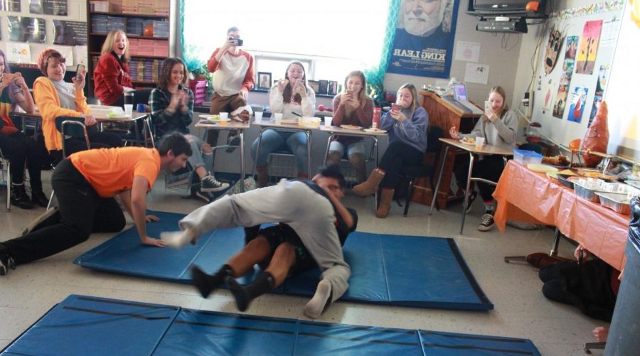 Erik Younkin and Kee Mosss wrestling entertains the class.