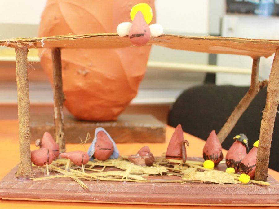 The nativity scene is recreated by Lucy Curran with yam people.