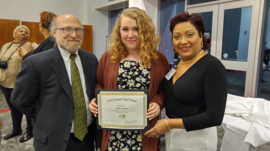 Senior Nell Pugliese receives the Lewis Atwater Youth Award pictured here with her father, Anthony Pugliese, and presenter Debra Martinez.