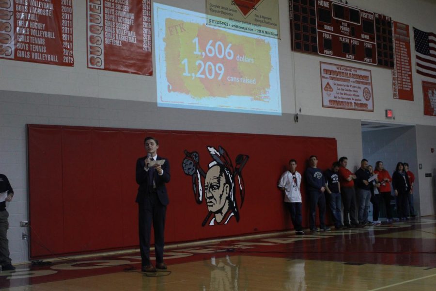 Senior Snow King candidate Kaleb Fair reveals how much money and canned goods were raised throughout the Snow King competition.