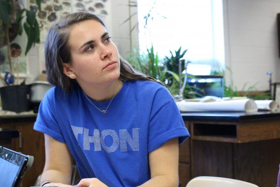Alumna Allyson Koller wears a blue THON shirt in support of the cause.
