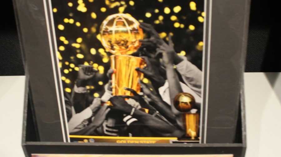 A picture of the NBA trophy in the NBA store in Times Square. The three story building is the perfect place for the biggest NBA fans.