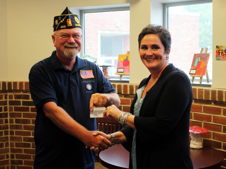 Featured in the photo are, from left, American Legion Austin L. Grove Post 403 Past Post Commander Randall Rill and Southern York County School District Social Services Coordinator Jill Platts.