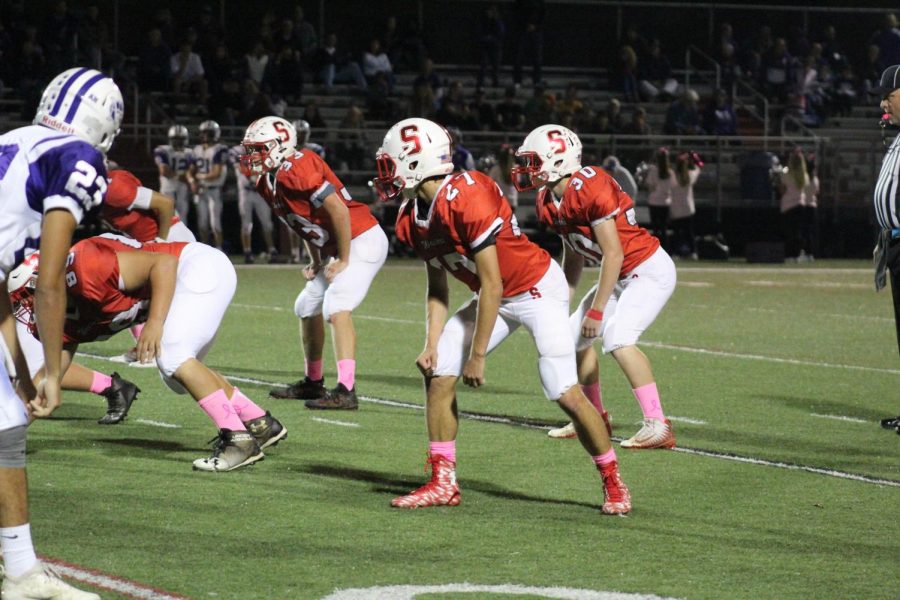 Varsity Football falls to Northern on Pink Out Night