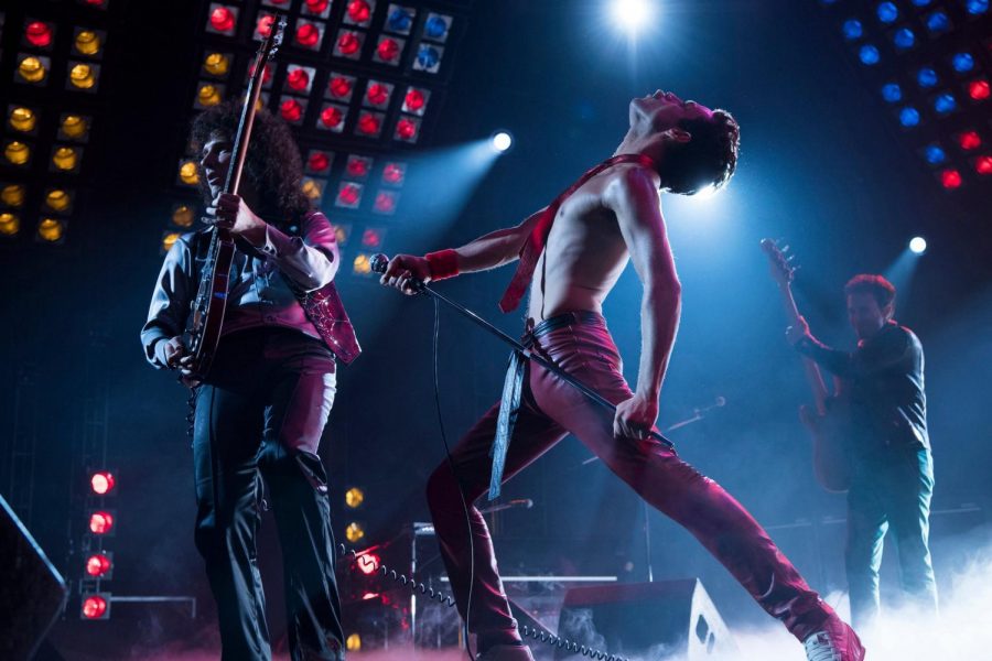 Gwilym Lee(left), Rami Malek(center), and Joe Mazzelo(right) perform in the Queen biopic Bohemian Rhapsody. Photo curtosy by Alex Bailey/ 20th Centry Fox