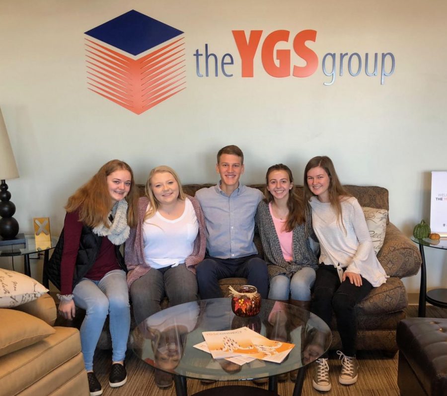 From left to right: junior Caroline Fox, senior Abigail Gallegos, senior Greyson Daviau, junior Emma Robert, and senior Amelia Eyster pose for a group picture in the YGS office.