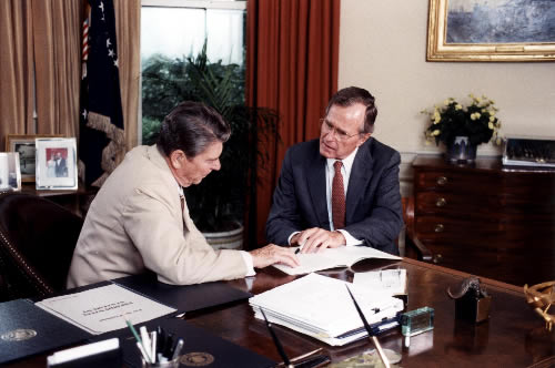 Bush worked along side President Ronald Reagan, because Bush was his vice president. Bush was a vice president before his own presidency. 
via Wikimedia Commons