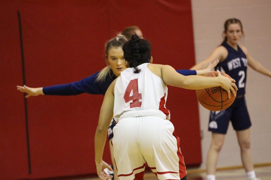 Galbreath squares off against an opponent in a game against West York. Galbreath was the tenth female in school history to reach 1,000 points, just one week after Walker accomplished the feat.  Galbreath is averaging 14 points-per-game for the 2018-19 season, according to team stats.