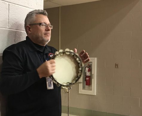 Band director Chris Poole guides the group through the basketball games. “The pep band has been around for quite some time,” Poole said. “In my...years at Susquehannock, we have had a band each year.” Photograph by Camryn Brakmann