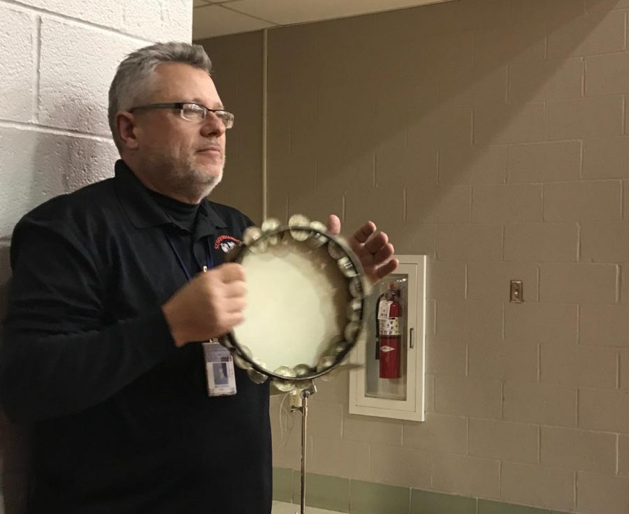 Band director Chris Poole guides the group through the basketball games. “The pep band has been around for quite some time,” Poole said. “In my...years at Susquehannock, we have had a band each year.” Photograph by Camryn Brakmann