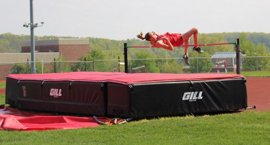 Sophomore Courtney Burgess ties for first place in the high jump with a mark of 4 6 at the Kennard-Dale meet. “It was really amazing, but at the same time I feel like it’s another chapter of my life ending and I’m ready to move on, but I’m still happy I got to hang out with my friends and do something I love,” said senior Julia Kelbaugh on leaving SHS Track. 