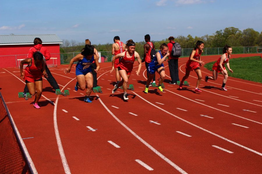 The girls track members sprint away from the starting line. 
SHS Track and Field competed against rival Kennard-Dale at home on April 30, 2019.