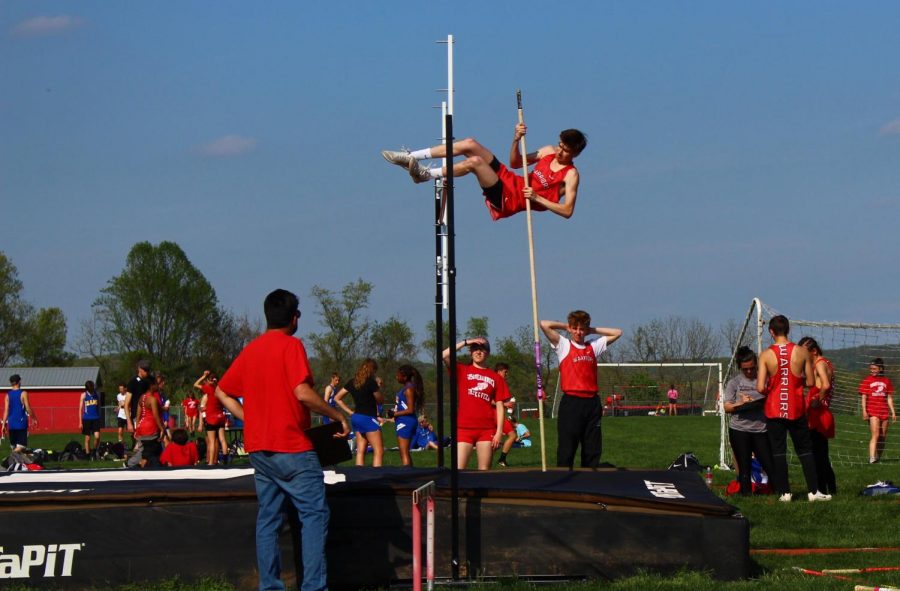 Junior Duncan McQuay competes in the pole vault in the meet against Kennard-Dale. 
Senior Michael Boampong won the pole vault competition in the meet with Kennard-Dale with a jump of 123.