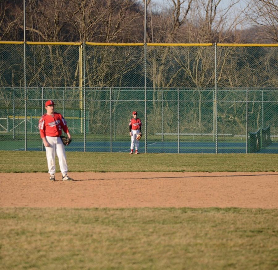 Warrior outfielders looking on as they watch the at-bat. 

via @_brian_penn on Instagram