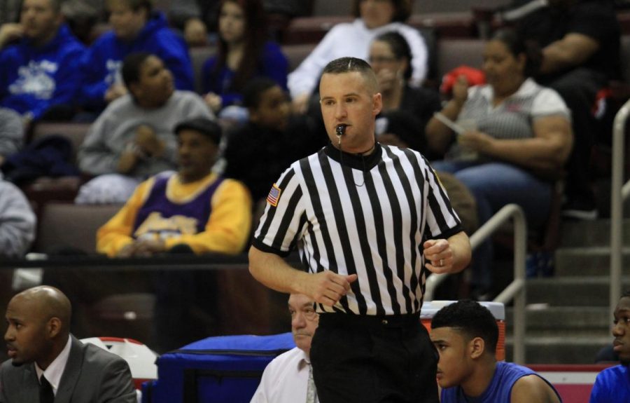 Kevin Lawrence keeps a close eye on the action as a PIAA basketball official.