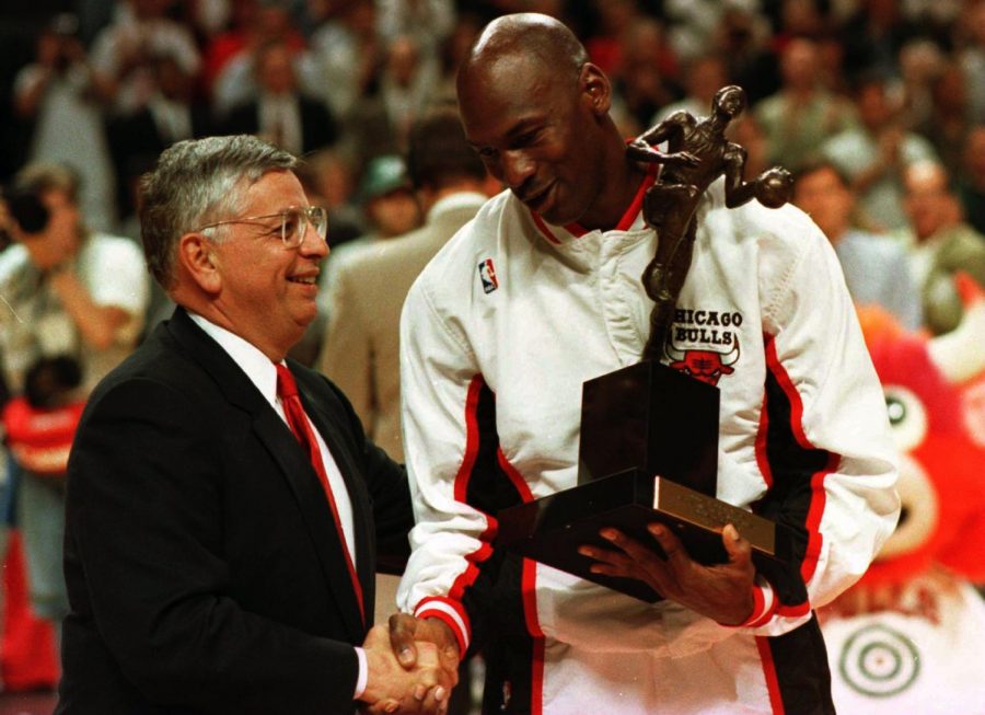 David Stern giving NBA Hall of Famer Michael Jordan the NBA MVP awarrd in 1996. 

via @timelesssports_