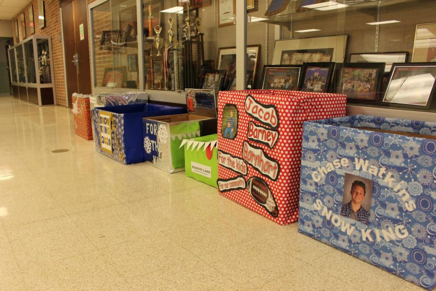 Snow Kings have decorated a box for students to donation canned goods and money. Photo by Mackenzie Womack.