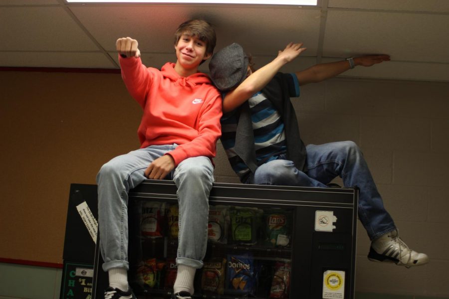 Michael Snyder (left)
Mateo Vega (right)
On top of the vending machine 
Photograph by Kai Fleming 