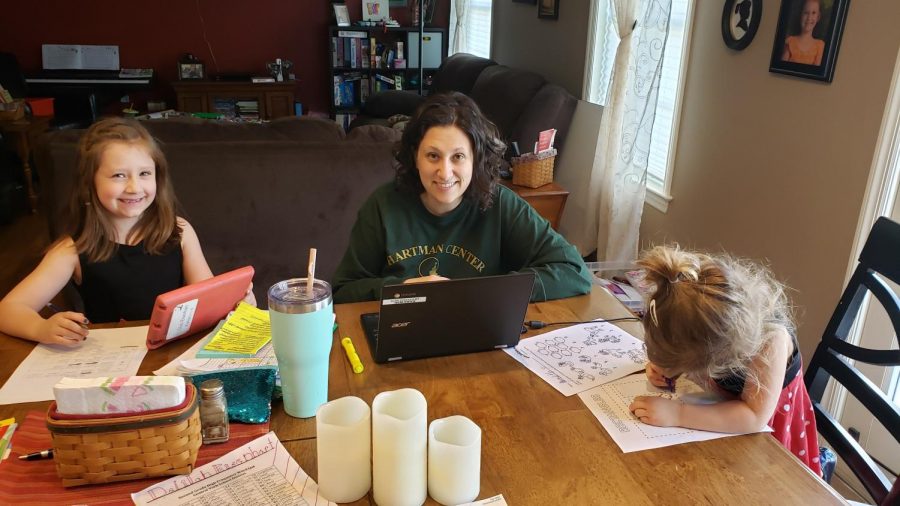 Math teacher, Kori Eisenhart juggles teaching and taking care of her daughters. Photograph by Kori Eisenhart