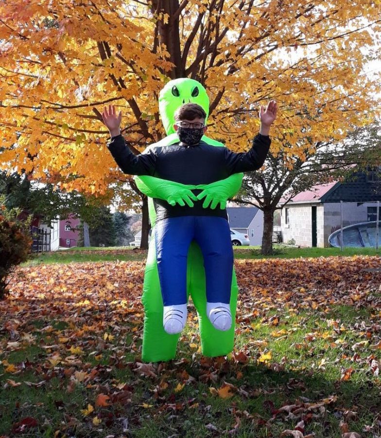 Justin Viands, a Southern Middle School student, poses in his Halloween costume while wearing a mask to protect against COVID-19. Photo by Alexa Viands