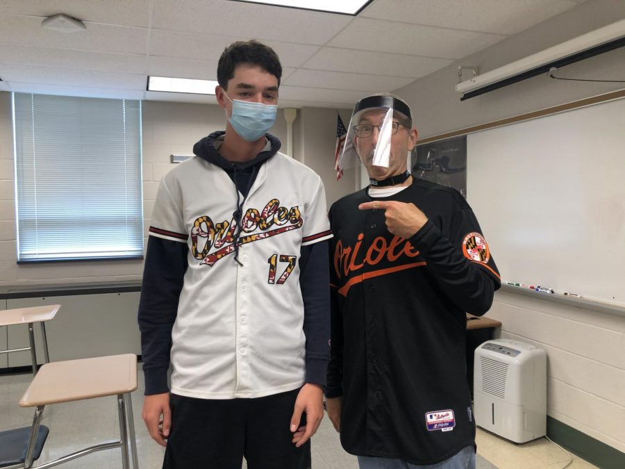 Teacher Matt Amberman and junior Gavin Comber support Orioles Baseball for Jersey Day. The other themed days included pajama day, tacky tourist day and school spirit day. Photograph by Elaine Paulk