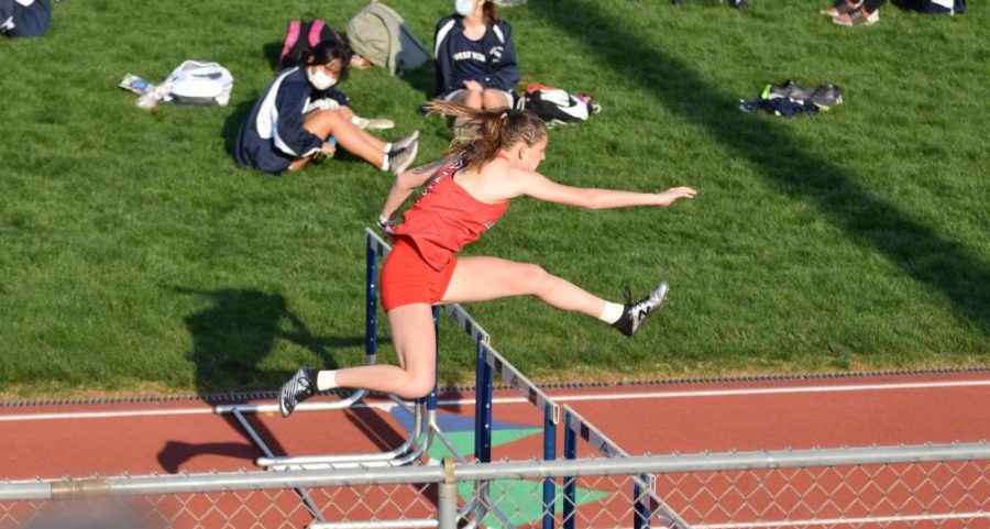 Ryleigh Marks hurdles in her race, the 100 meter hurdle, where she broke the record that was set in 1980.