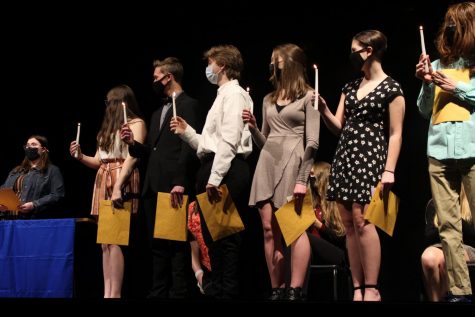 International Thespian Society (ITS) students light candles to symbolize their induction to the organization, named in honor of Thespis, the first actor to ever take the stage in Ancient Greece. Susquehannock represents ITS Troupe 4088, one of the thousands of troupes across the country. Inductees must have participated in over 100 hours of theatre and have assisted with at least 2 shows. Photo by Alexa Viands