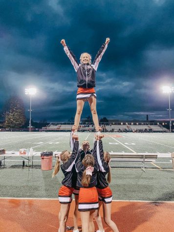 cheerleader feet pose