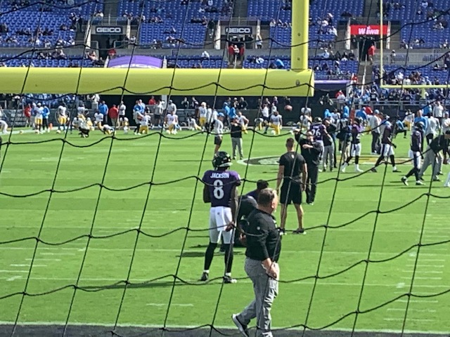 Ravens quarterback Lamar Jackson warms up on the field prior to the game against the Los Angeles Chargers on Oct. 17. Fans getting to the game early trying to get autographs form players as they enter and exit the field will end up with a view like this.
Photograph by Jacob Stroh