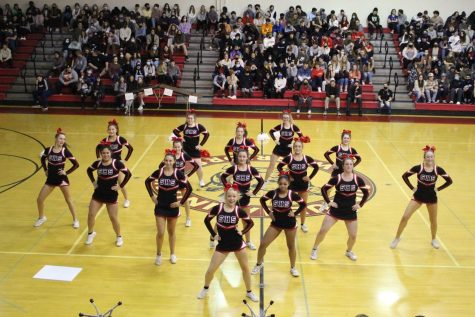 The cheer team performs their competition routine at the Snow King pep rally. Photograph by Jacob Stroh