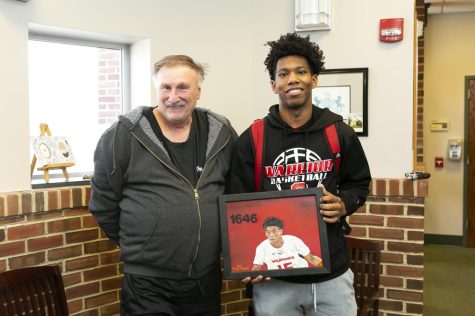 Jalen Franklin meets with past record holder Frank Wright.   Photograph by Artemas Mott