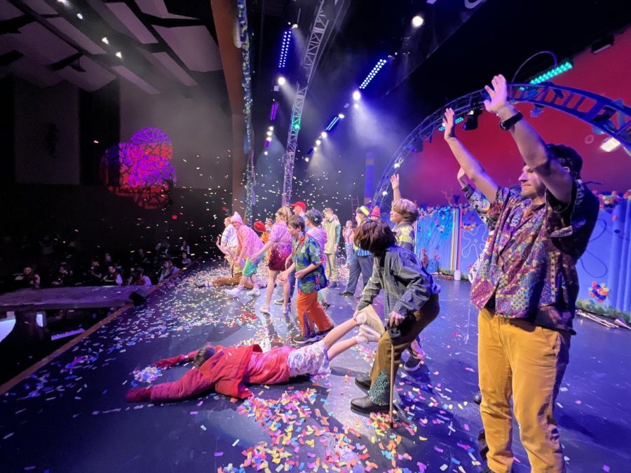 The cast celebrates through the confetti at the end of the show during the SpongeBob Theme Song after their first successful performance on opening night. Sophomore Tanner Russel works with the lighting team to subtly add unique colors in each scene. My role in the show aided the lighting team in creating the desired moods for the show, Russel said. As a spot operator, I helped focus the attention of the audience as well as give light to areas that were otherwise dark. Photograph by Ian Davis