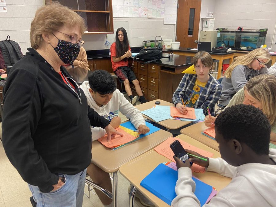 Kyprianou helps students prepare for the Keystones in one of Younkins biology classes. Photograph by KC ONeill