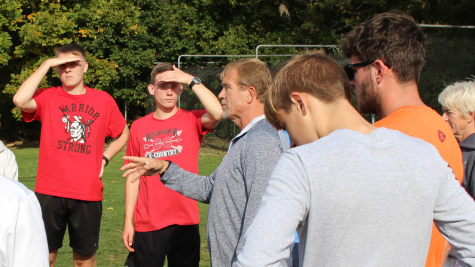 Cross country coach Jim Lebo Instructs his runners at the start of practice. Photograph Courtesy of Richard Harper