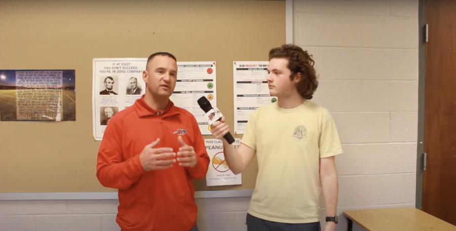 Reporter Devin Gilbert talk with Kevin Lawrence about upcoming leadership class.
Photograph by Devin Gilbert
