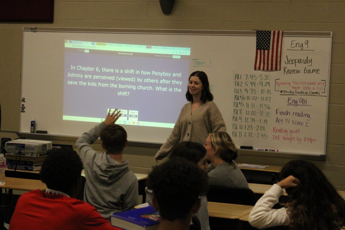  English teacher Kelly Porter plays a review game with her students.