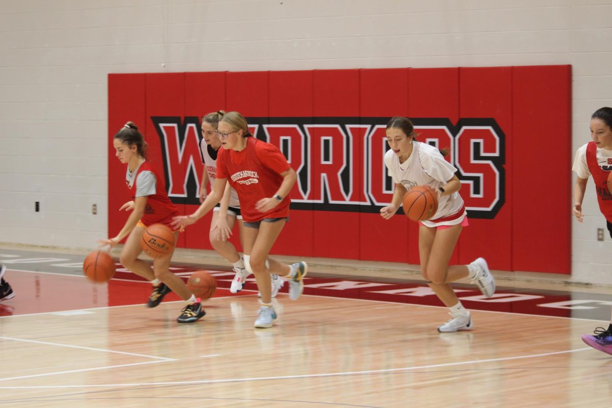  (From left to right) Grace Woods, Erin Jackson, Natalie Womack, Kiersten Holloway compete in a ball handling drill during a practice in early December.
Head Coach Alex Fancher tries to keep practices efficient, especially once the game schedule begins. 
We usually practice anywhere from an 1 hour and a half to 2 hours depending on how many games we play that week. Fancher said. 
Photograph by Kendall Single